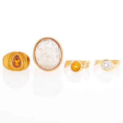 Lot 1232 - Group of Four Gold, Citrine and Carved Rock Crystal Rings