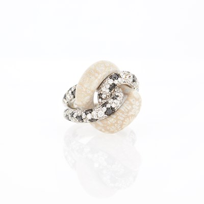 Lot 1063 - White Gold, Carved Agate, Black Diamond and Diamond Ring