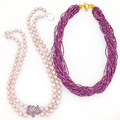 Lot 1252 - Double Strand Pink Cultured Pearl, White Gold and Gem-Set Pendant-Necklace and Multistrand Purple Stone and Gold Bead Necklace with High-Karat Gold Clasp