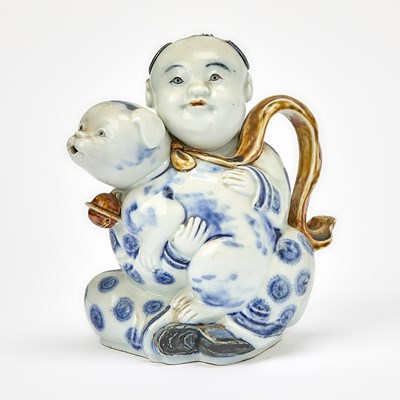 Lot 329 - A Japanese Hirado Blue and White and Brown Porcelain Ewer