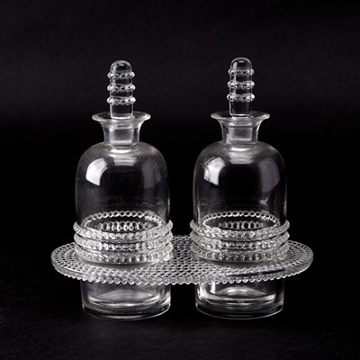 Lot 757 - R. Lalique Molded Glass "Nippon" Pattern Oil and Vinegar Cruet Set with Stoppers