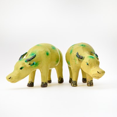 Lot 615 - A Pair of Chinese Glazed Porcelain Oxen