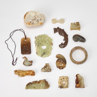 Lot 512 - Group of Fifteen Chinese Archaistic and Pre-Qing Style Jade Carvings