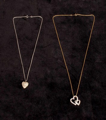Lot 177 - Two White and Yellow Gold Heart Pendant Necklaces