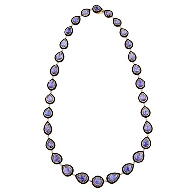 Lot 2086 - Low Karat White Gold, Cabochon Tanzanite, Diamond and Black Enamel Necklace