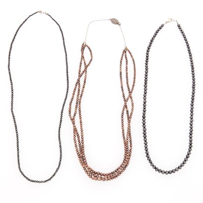 Lot 2226 - Three Brown and Black Diamond Bead Necklaces