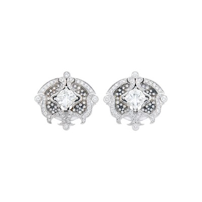 Lot 1081 - Pair of Two-Color Gold and Diamond Earclips