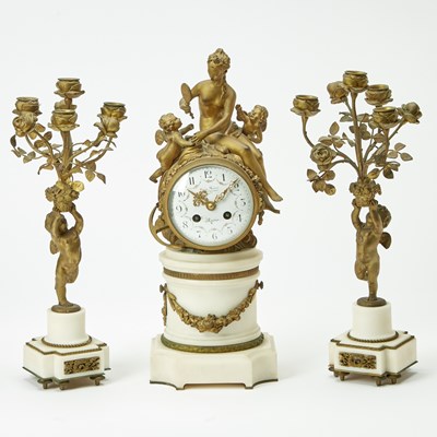 Lot 187 - Louis XVI Style Gilt-Bronze and White Marble Three-Piece Clock Garniture