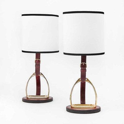 Lot 720 - Pair of Longchamp Paris Gilt-Metal and Leather Equestrian Themed Table Lamps