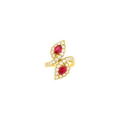 Lot 36 - Van Cleef & Arpels Gold Ruby and Diamond Crossover Ring, France