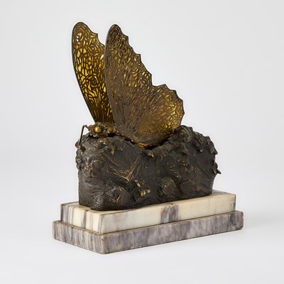 Lot 232 - Carl Kauba Vienna Gilt and Patinated Bronze and Plique-à-Jour Enamel Mechanical "Butterfly" Maiden