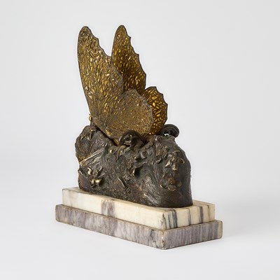Lot 232 - Carl Kauba Vienna Gilt and Patinated Bronze and Plique-à-Jour Enamel Mechanical "Butterfly" Maiden