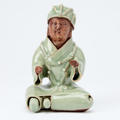 Lot 510 - A Chinese Longquan Celadon Seated Figure of a Monk