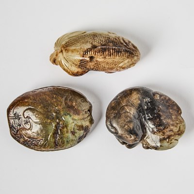 Lot 435 - A Group of Three Chinese Mottled Jade Toggles