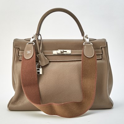 Lot 1194 - Hermès Etoupe Togo Leather Retourne Kelly 35 Bag