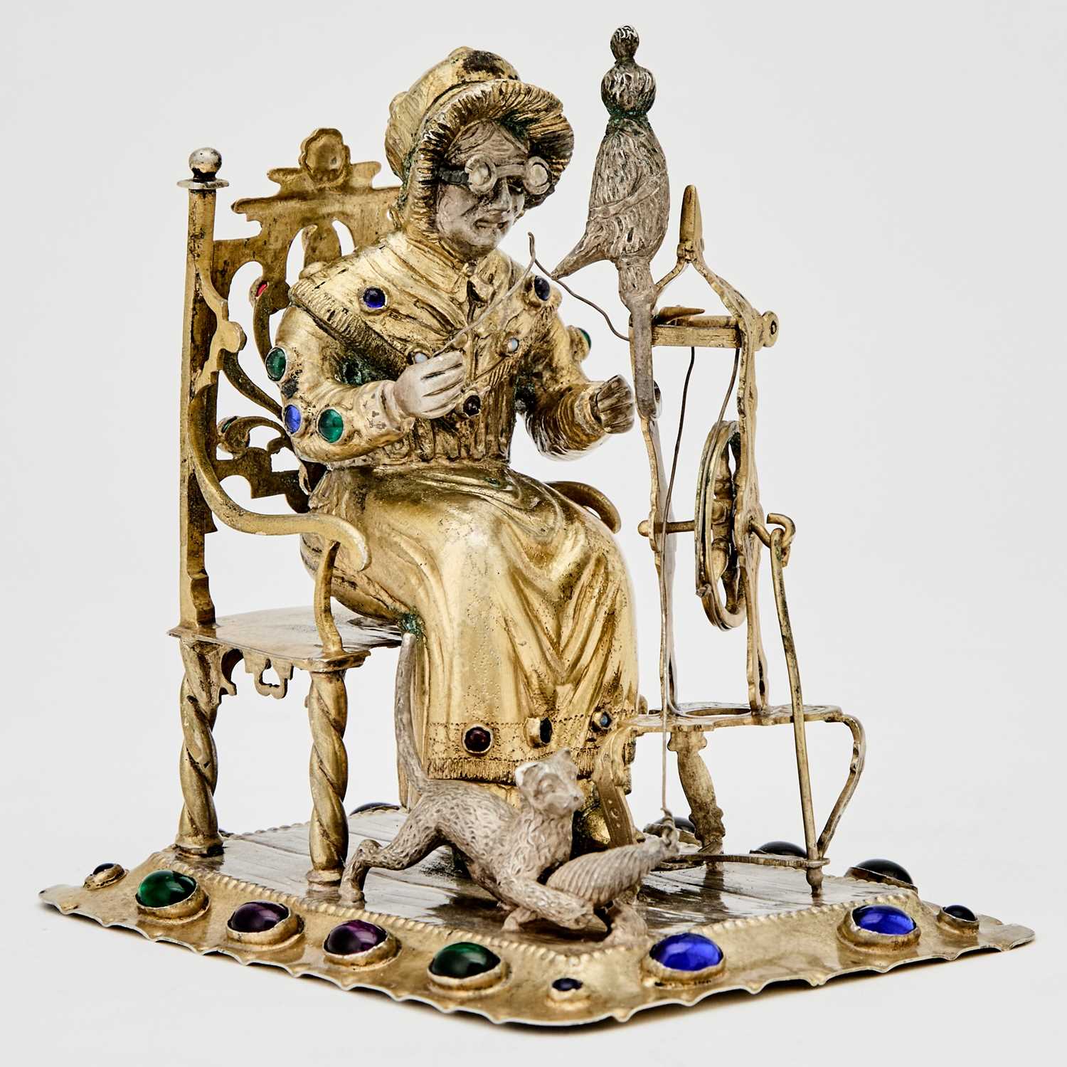 Lot 164 - Continental Gem-Set Silver Figure of a Woman at a Spinning Wheel