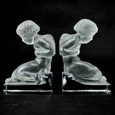 Lot 742 - Pair of R. Lalique Molded Glass "Amour" Figural Bookends