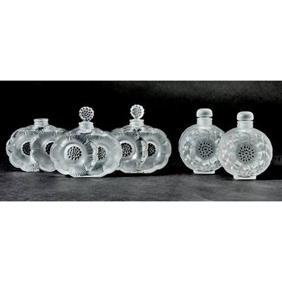 Lot 750 - Five Lalique Molded Glass and Enamel Perfume Bottles