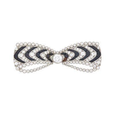 Lot 186 - Platinum, Diamond and Black Onyx Bow Brooch, France