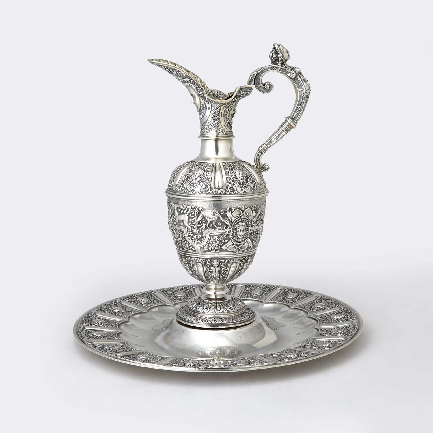 Lot 114 - Victorian Sterling Silver "Cellini" Pattern Ewer and Stand