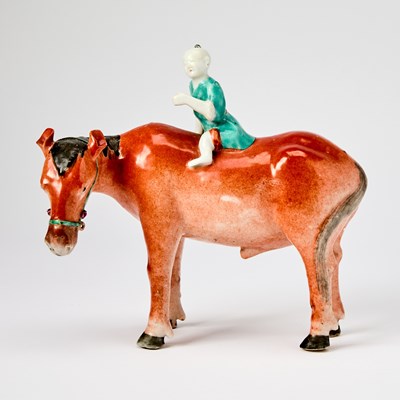 Lot 230 - A Chinese Enameled Porcelain 'Boy on Horse' Figural Grouping