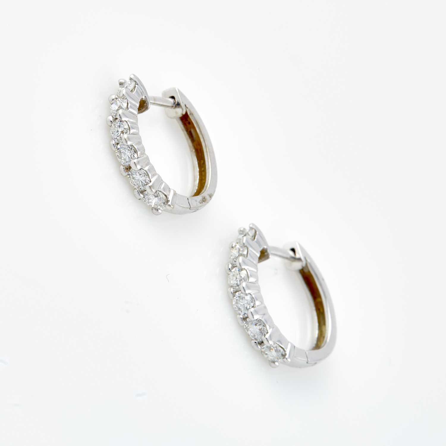 Lot 154 - Two Diamond Earrings, 12 diamonds about 1.20 cts., 14K 2 dwt.
