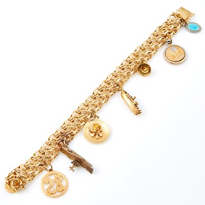 Lot 345 - Gold Charm Bracelet with 7 gold and metal charms attached, 14k, 9k and Metal 30 dwt. all, damaged