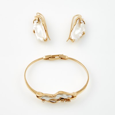 Lot 377 - Diamond and Bead Rigid Bracelet and Two Earrings, 9 diamonds about 0.40 ct., 14K 16 dwt. all