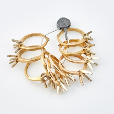 Lot 408 - Ten Gold Rings, 14K 18 dwt., stones missing