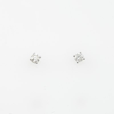 Lot 477 - Two Diamond Earrings about 1.10 cts., 14K 1 dwt.