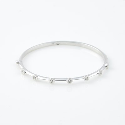 Lot 499 - Diamond Rigid Bracelet, 7 diamonds about 0.35 ct., 18K 8 dwt.