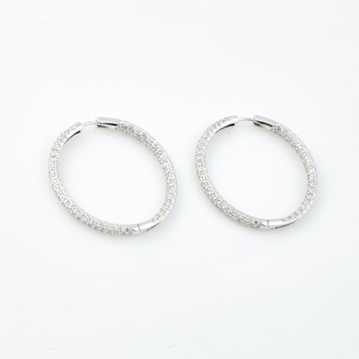 Lot 509 - Two Diamond Earrings, 261 diamonds about 2.60 cts., 14K 8 dwt., stone missing