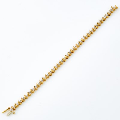 Lot 607 - Diamond Tennis Bracelet, 38 diamonds about 0.75 ct., 14K 7 dwt.