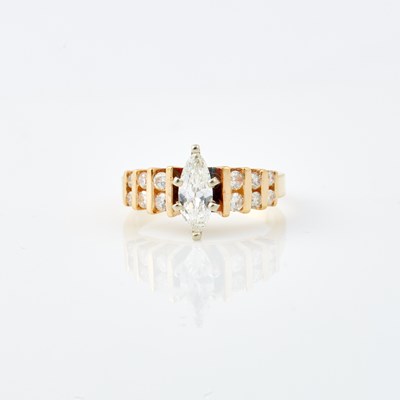 Lot 610 - Diamond Engagement Ring, 13 diamonds, center stone about 0.45 ct., 12 stones about 0.30 ct., 14K    3 dwt.