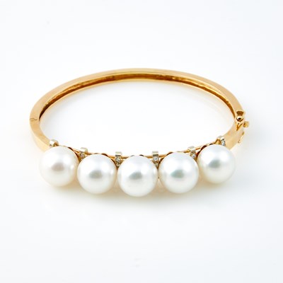 Lot 668 - Diamond and Bead Rigid Bracelet, 14K 22 dwt. all