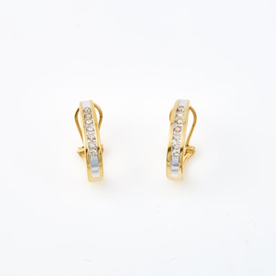 Lot 710 - Two Diamond Earrings, 14 diamonds about 0.50 ct., 14K 3 dwt.