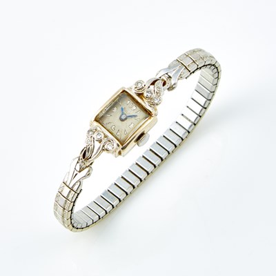 Lot 711 - Ladys Diamond Wrist Watch, 10 diamonds, 17 Jewels, Bulova, 14K