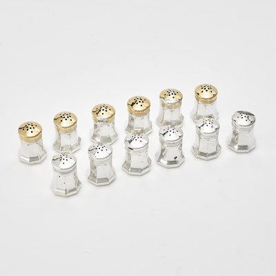 Lot 345 - Set of Twelve Cartier Sterling Silver Individual Salt and Pepper Casters