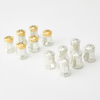Lot 915 - Set of Twelve Cartier Sterling Silver Individual Salt and Pepper Shakers