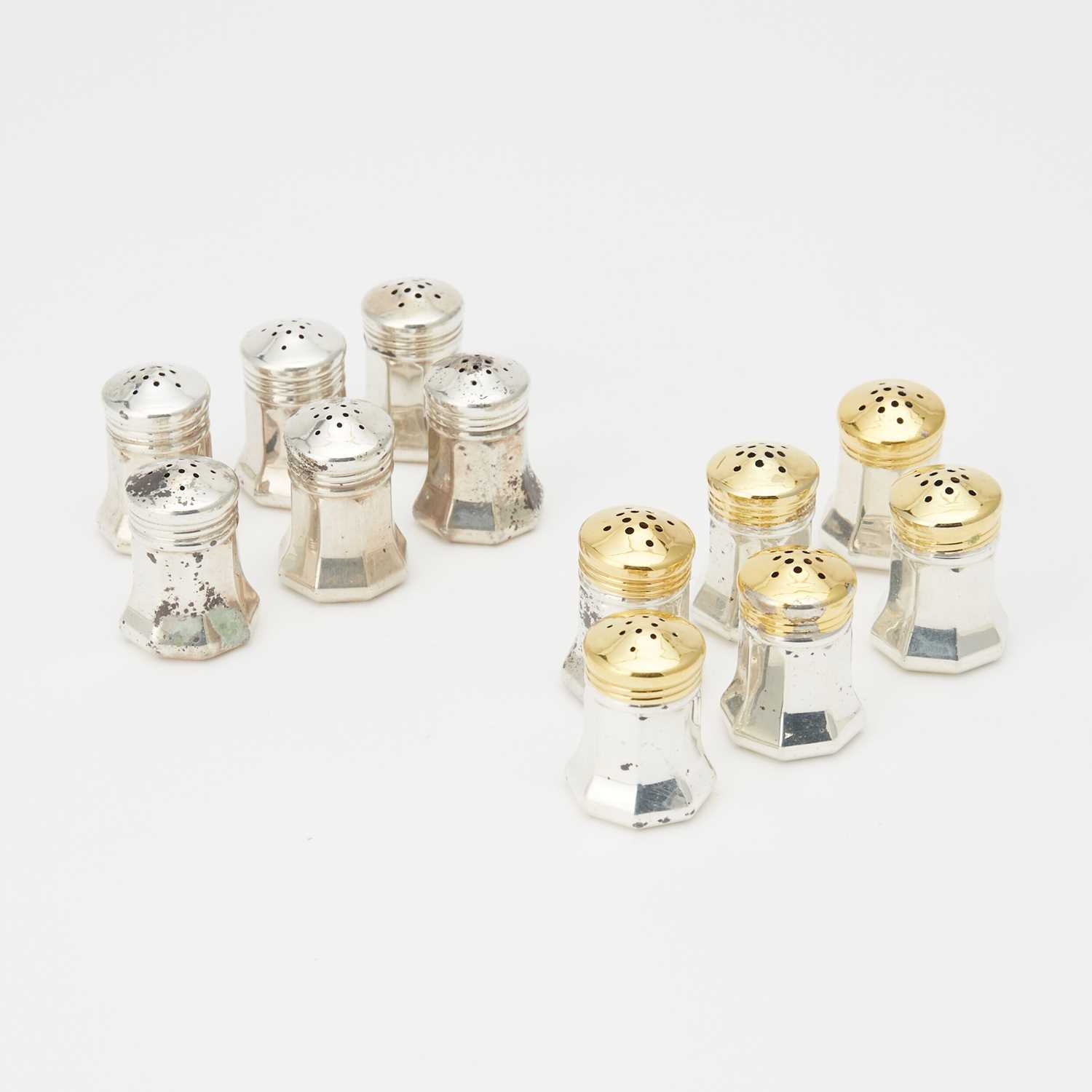 Lot 188 - Set of Twelve Cartier Sterling Silver Individual Salt and Pepper Casters