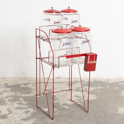 Lot 88 - Set of Four Lance Cracker Glass Jars on Metal Display Rack