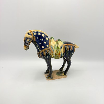 Lot 1106 - Chinese Sancai Glazed Porcelain Figure of a Horse