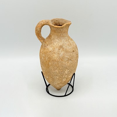 Lot 1123 - Middle Eastern Terracotta Jug.
