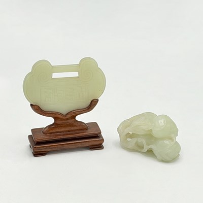 Lot 1127 - Chinese White Jade Gourds Grouping and White Jade Lock Form Plaque with a Wood Stand