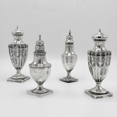 Lot 1207 - Four George III Sterling Silver Casters