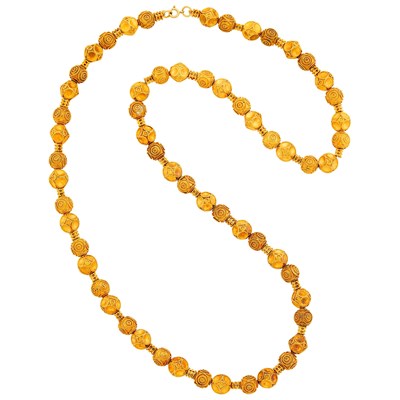 Lot 1119 - Long Gold Bead Necklace