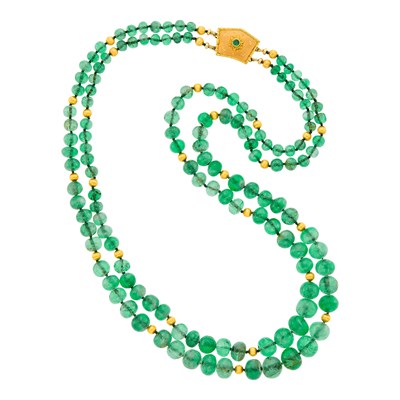 Lot 52 - Buccellati Double Strand Emerald and Gold Bead Necklace with Two-Color Gold and Emerald Clasp