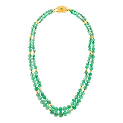 Lot 52 - Buccellati Double Strand Emerald and Gold Bead Necklace with Two-Color Gold and Emerald Clasp