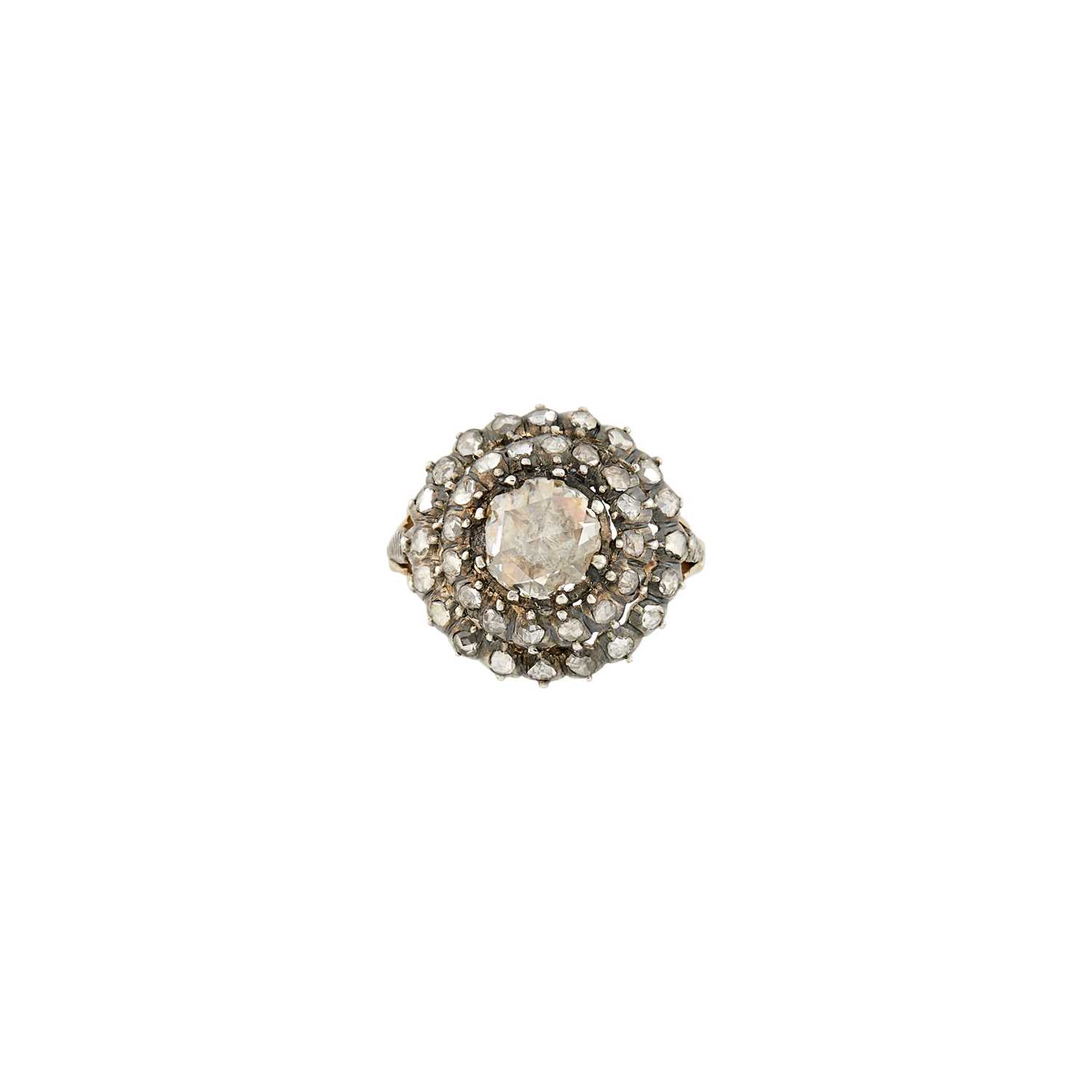 Lot 1070 - Silver, Gold and Diamond Ring