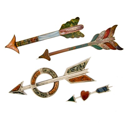 Lot 2190 - Four Silver, Low Karat Gold and Scottish Agate Arrow Brooches